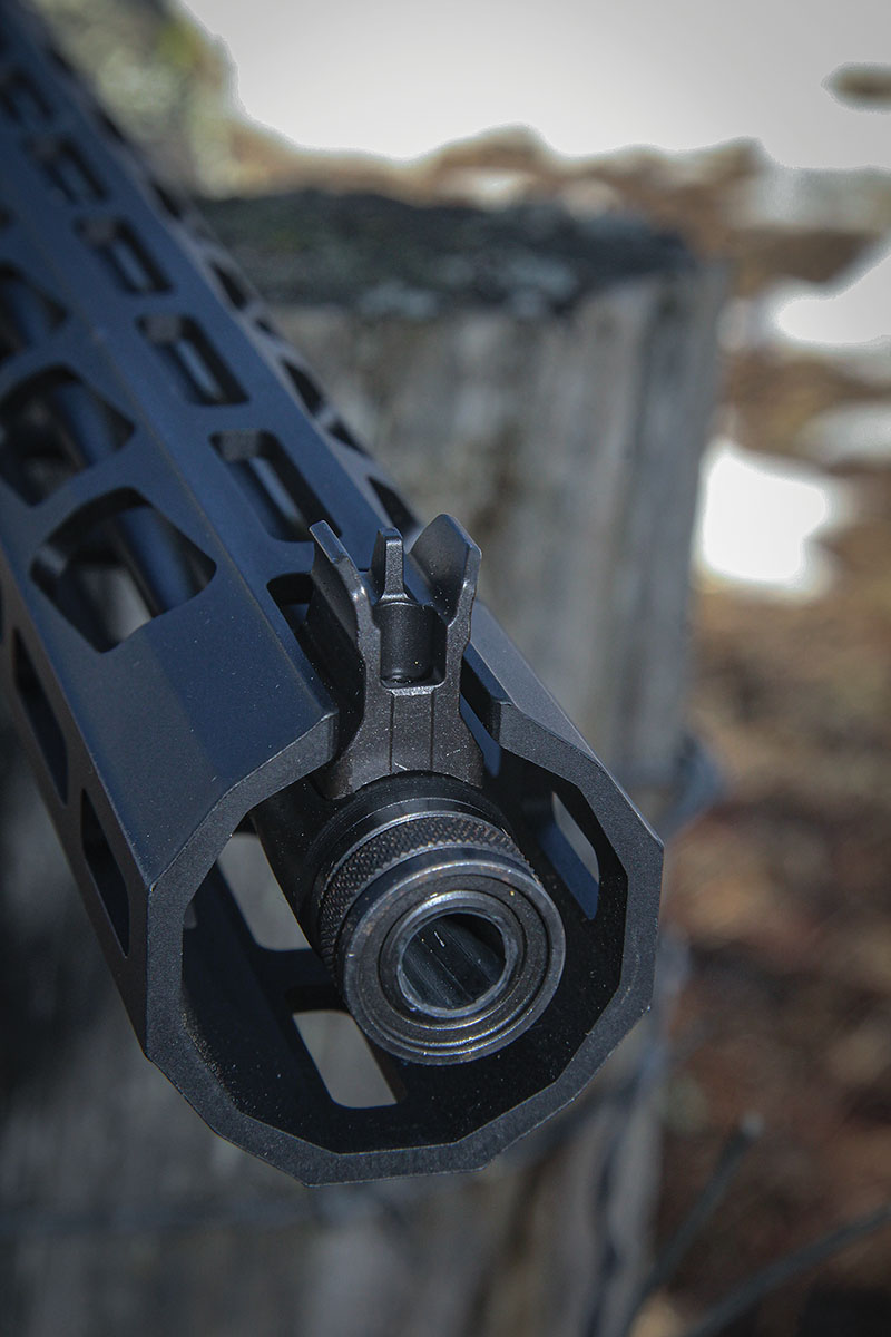 The Ruger PC Carbine’s front sight is a fixed blade protected by opposing “bunny ear” posts that also help align the ghost-ring rear sight.